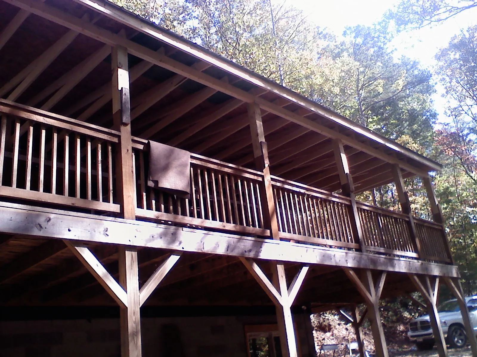 Timber framing under a new elevated porch and deck — Roof Leak Repair in White Plains by Roofing Brothers